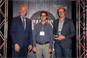 Les représentants de la Fromagerie La Station reçoivent son trophée pour le meilleur fromage au lait cru des mains de M. André Lamontagne, ministre de l’Agriculture, des Pêcheries et de l’Alimentation et ministre responsable de la région du Centre-du-Québec.
